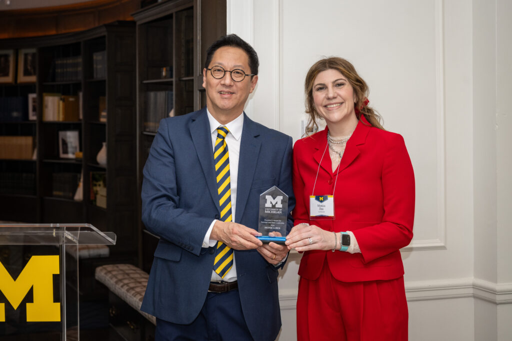 President Santa J. Ono with Monica Dus.